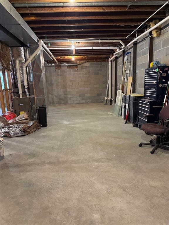 3112 N 155th St, Basehor, KS 66007 - unfinished basement featuring concrete block wall