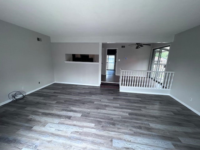 419 W 104th St Unit D, Kansas City, MO 64114 - unfurnished room featuring plenty of natural light, wood finished floors, and a ceiling fan