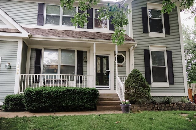 11669 S Parkwood Dr, Olathe, KS 66061 - view of front of property with a porch