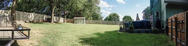 11669 S Parkwood Dr, Olathe, KS 66061 - fenced backyard with a shed and a wooden deck