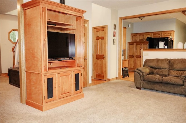 11669 S Parkwood Dr, Olathe, KS 66061 - living area with light colored carpet and baseboards
