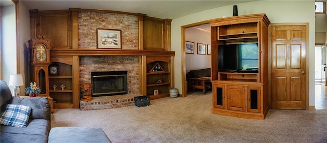 11669 S Parkwood Dr, Olathe, KS 66061 - carpeted living area featuring a fireplace