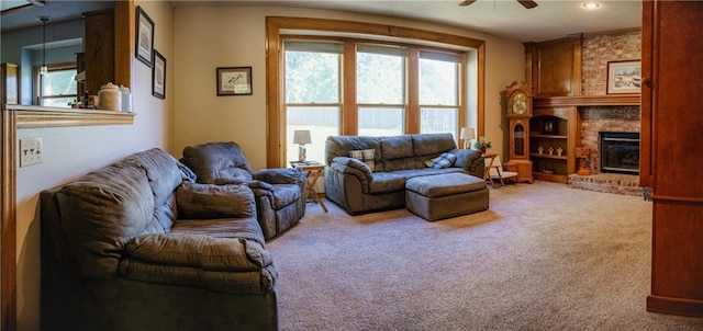 11669 S Parkwood Dr, Olathe, KS 66061 - carpeted living area featuring plenty of natural light, a brick fireplace, and ceiling fan