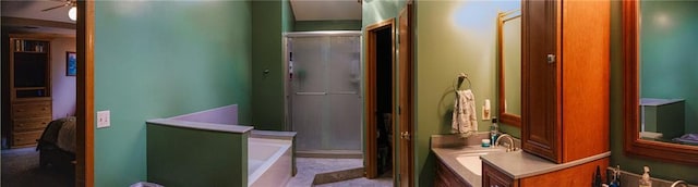 11669 S Parkwood Dr, Olathe, KS 66061 - bathroom featuring vanity, a garden tub, and ceiling fan