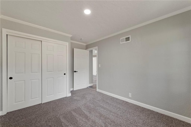 2101 Spruce St, Leavenworth, KS 66048 - unfurnished bedroom with carpet flooring, ornamental molding, a closet, and recessed lighting