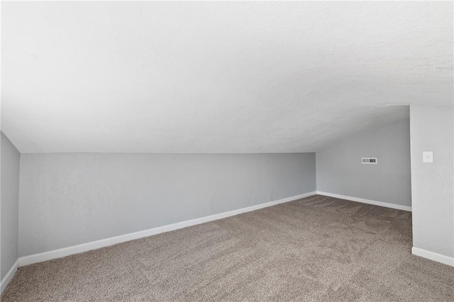 2101 Spruce St, Leavenworth, KS 66048 - bonus room featuring vaulted ceiling and carpet flooring