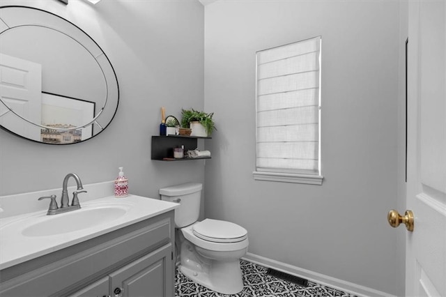 12499 S Marion St, Olathe, KS 66061 - bathroom featuring vanity and tile patterned flooring