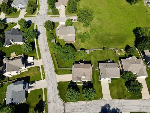 12499 S Marion St, Olathe, KS 66061 - aerial view of property and surrounding area featuring nearby suburban area