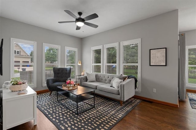 12499 S Marion St, Olathe, KS 66061 - living area featuring wood finished floors and a ceiling fan