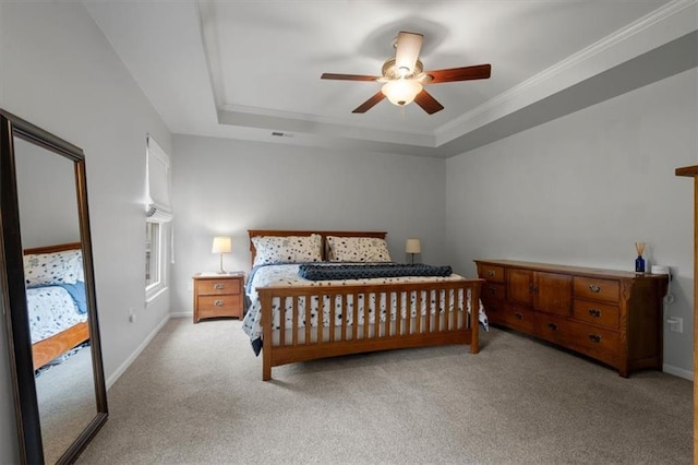 12499 S Marion St, Olathe, KS 66061 - carpeted bedroom featuring a tray ceiling, ceiling fan, and ornamental molding
