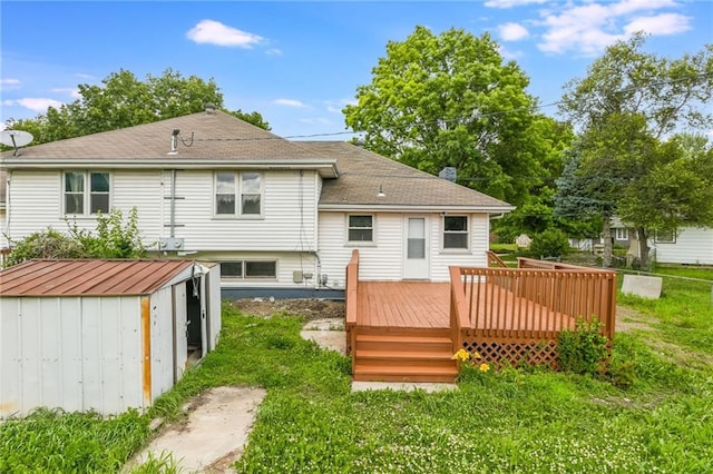729 S Central St, Olathe, KS 66061 - rear view of house with a deck, a storage unit, and a yard