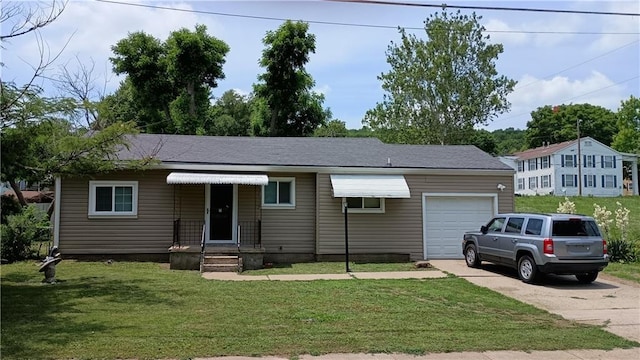 107 N 20th St, Leavenworth, KS 66048 - view of front of house with a garage, concrete driveway, and a front lawn