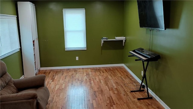 107 N 20th St, Leavenworth, KS 66048 - living area with wood finished floors and plenty of natural light