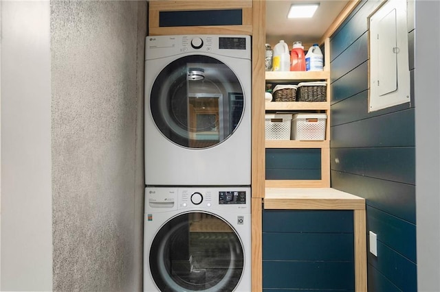 118 Village St, Tonganoxie, KS 66086 - laundry room with stacked washer and clothes dryer and electric panel