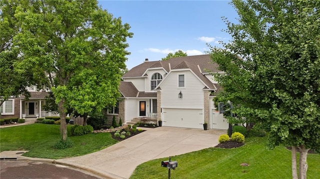 5209 W 161st St, Overland Park, KS 66085 - traditional-style home featuring driveway, an attached garage, and a front yard
