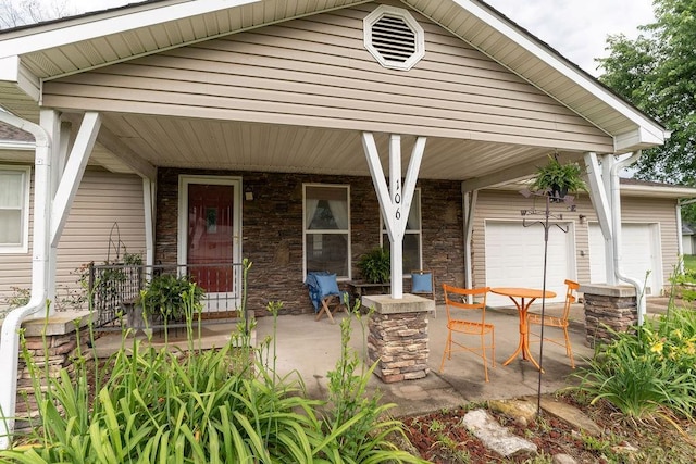 106 S Clark St, Adrian, MO 64720 - porch with a garage