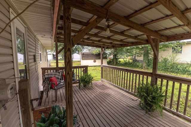 106 S Clark St, Adrian, MO 64720 - wooden terrace with an outbuilding and a yard