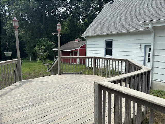 201 W Royle St, Richmond, MO 64085 - deck featuring a lawn