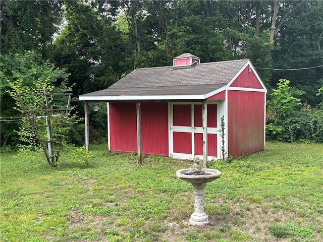201 W Royle St, Richmond, MO 64085 - view of shed with a view of trees