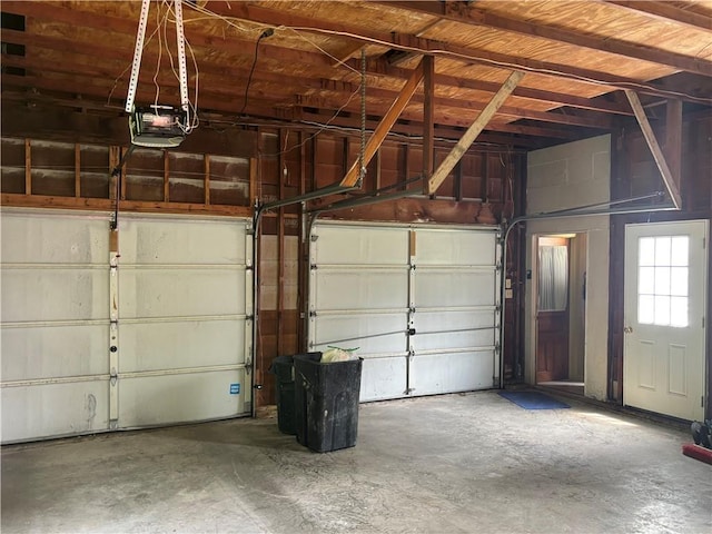 201 W Royle St, Richmond, MO 64085 - garage featuring a garage door opener
