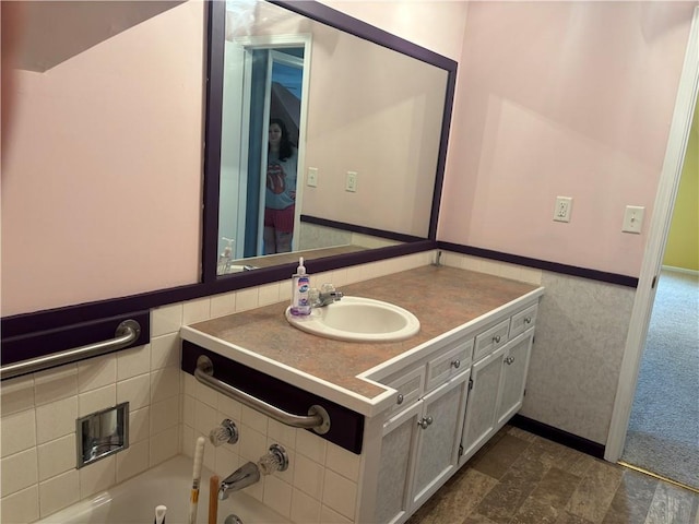 201 W Royle St, Richmond, MO 64085 - full bathroom featuring a garden tub and vanity