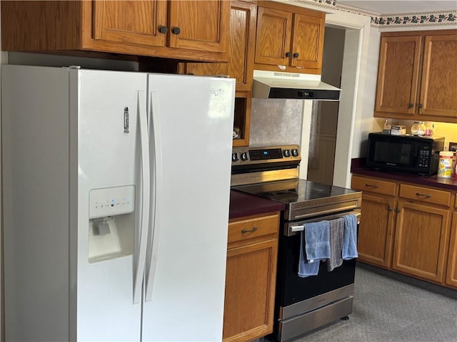201 W Royle St, Richmond, MO 64085 - kitchen featuring white fridge with ice dispenser, stainless steel electric range, under cabinet range hood, black microwave, and dark countertops