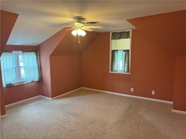 201 W Royle St, Richmond, MO 64085 - bonus room with a ceiling fan, carpet flooring, and vaulted ceiling