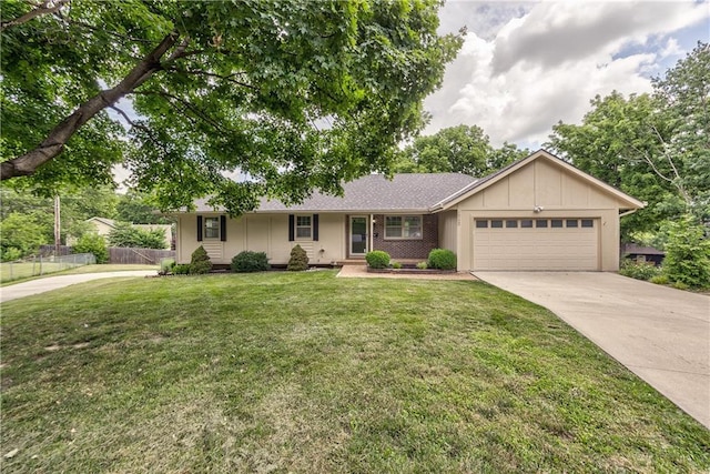 10706 W 50th Ter, Shawnee, KS 66203 - ranch-style house with an attached garage, concrete driveway, and board and batten siding