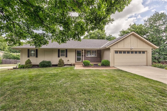 10706 W 50th Ter, Shawnee, KS 66203 - ranch-style home featuring a garage, board and batten siding, concrete driveway, and a front lawn
