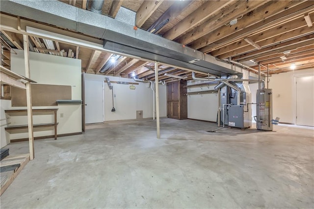 10706 W 50th Ter, Shawnee, KS 66203 - unfinished below grade area with gas water heater and heating unit