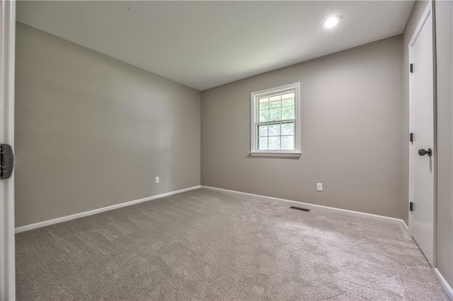 10706 W 50th Ter, Shawnee, KS 66203 - carpeted spare room with baseboards and recessed lighting