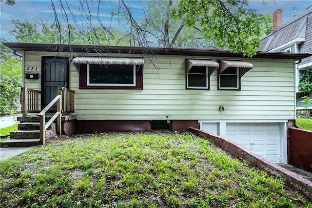 531 S Cedar Ave, Independence, MO 64053 - view of front of house with an attached garage