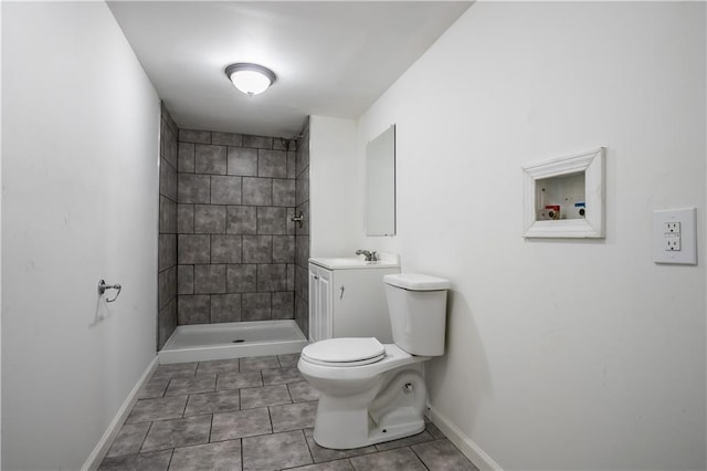 531 S Cedar Ave, Independence, MO 64053 - full bathroom with vanity, a tile shower, and tile patterned flooring