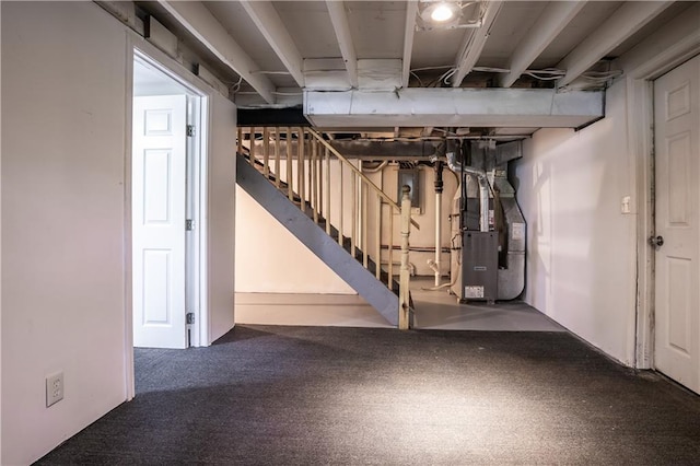 531 S Cedar Ave, Independence, MO 64053 - below grade area featuring heating unit and stairs
