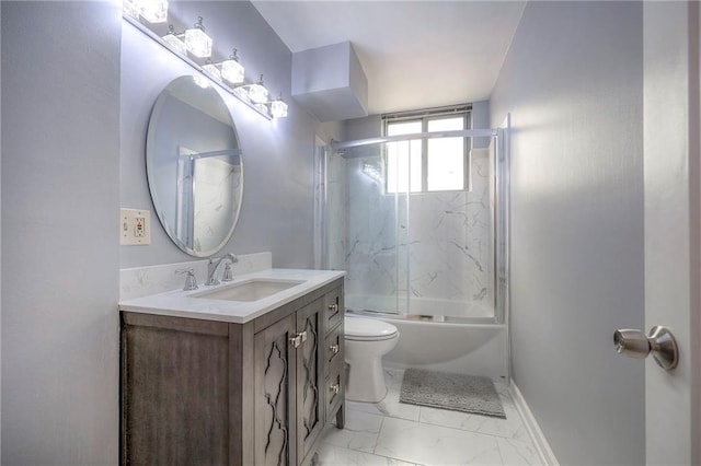 600 E 8th St Unit 4T, Kansas City, MO 64106 - full bathroom with vanity, shower / bath combination with glass door, and marble look tiles