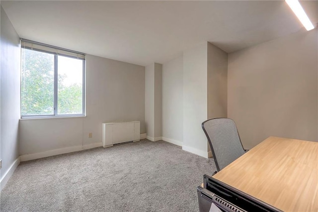 600 E 8th St Unit 4T, Kansas City, MO 64106 - carpeted office with baseboards and radiator