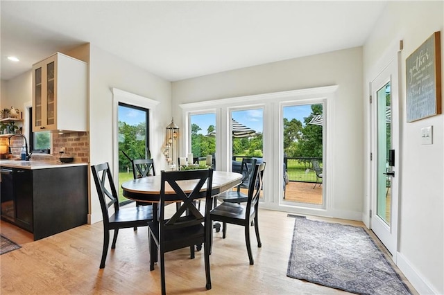 15376 Loring Rd, Bonner Springs, KS 66012 - dining space with light wood-style floors and recessed lighting