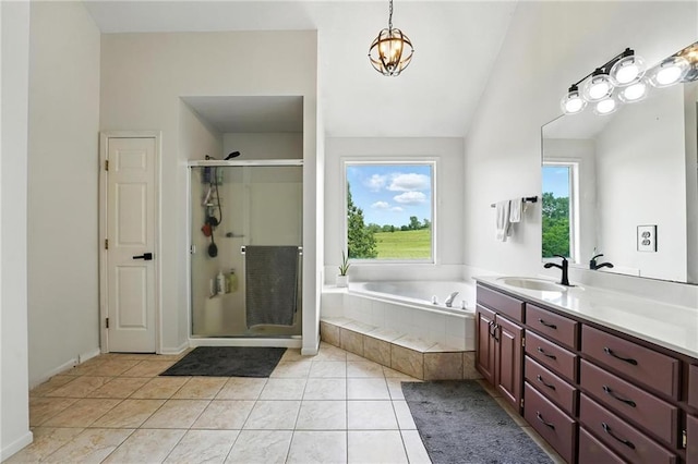 15376 Loring Rd, Bonner Springs, KS 66012 - full bathroom featuring a bath, a shower stall, vanity, a chandelier, and tile patterned flooring