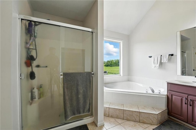 15376 Loring Rd, Bonner Springs, KS 66012 - full bathroom with vanity, tile patterned floors, a shower stall, a bath, and lofted ceiling