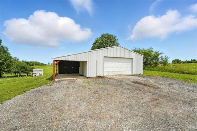 15376 Loring Rd, Bonner Springs, KS 66012 - garage featuring a detached garage and driveway