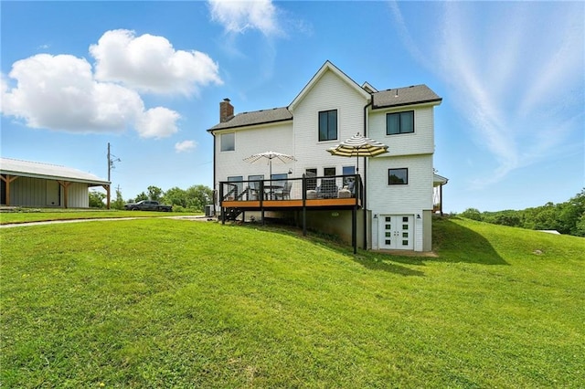 15376 Loring Rd, Bonner Springs, KS 66012 - back of house with a deck, french doors, a lawn, and a chimney