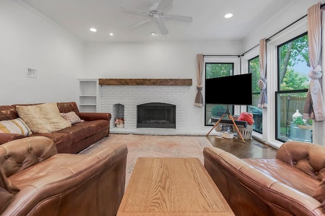 8148 Lingle Ln, Lenexa, KS 66215 - living room with a fireplace, recessed lighting, and ceiling fan