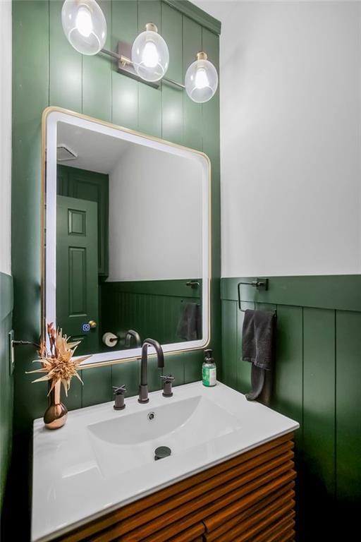 8148 Lingle Ln, Lenexa, KS 66215 - bathroom with vanity and a decorative wall