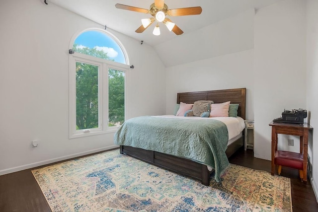 8148 Lingle Ln, Lenexa, KS 66215 - bedroom with wood finished floors, vaulted ceiling, and a ceiling fan