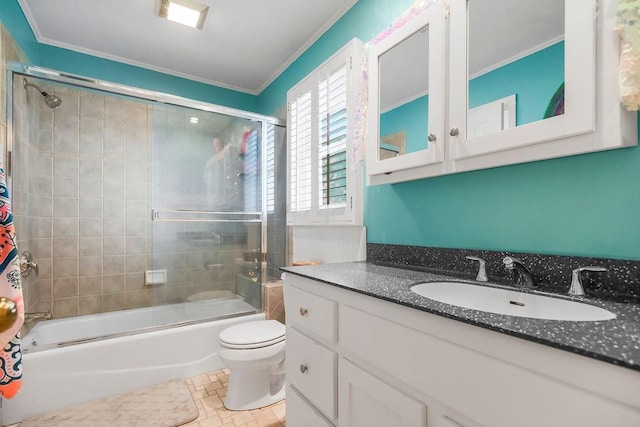 8148 Lingle Ln, Lenexa, KS 66215 - bathroom with ornamental molding, vanity, and bath / shower combo with glass door