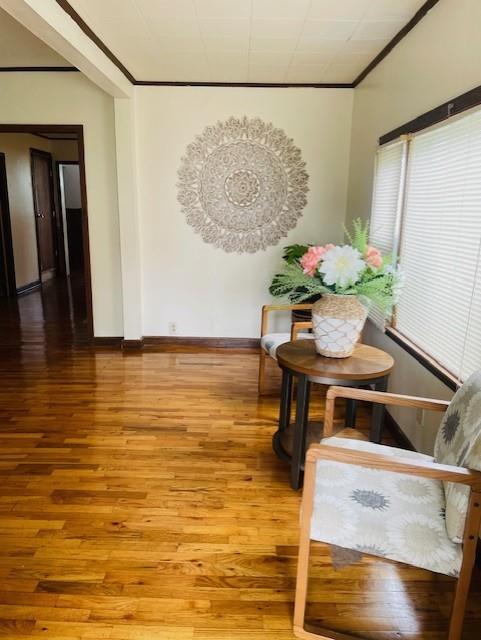 3119 Seneca St, Saint Joseph, MO 64507 - dining room with wood finished floors and crown molding