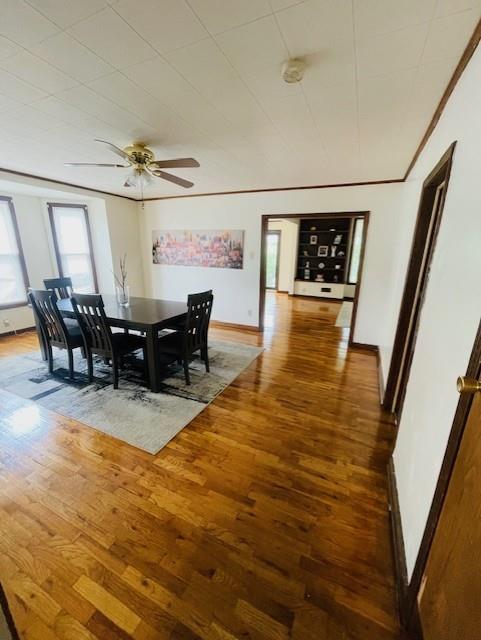 3119 Seneca St, Saint Joseph, MO 64507 - dining room with wood finished floors and ceiling fan