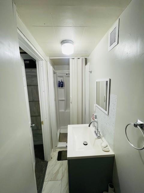 3119 Seneca St, Saint Joseph, MO 64507 - bathroom with vanity and a stall shower