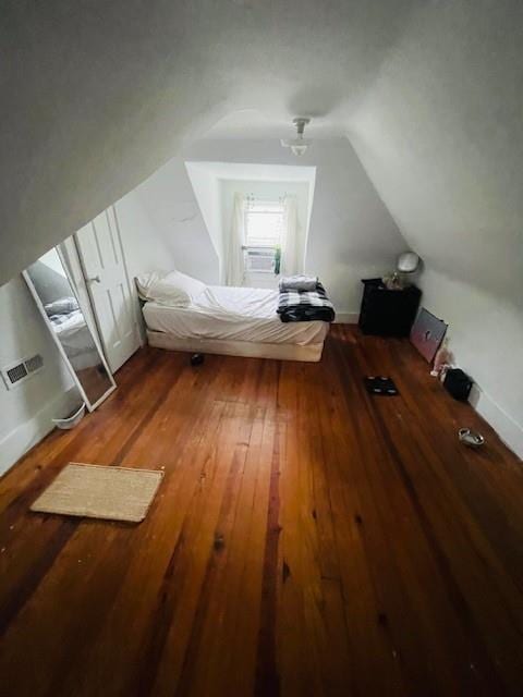 3119 Seneca St, Saint Joseph, MO 64507 - bedroom featuring lofted ceiling and hardwood / wood-style floors