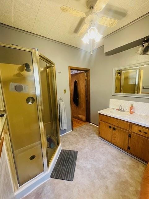 3119 Seneca St, Saint Joseph, MO 64507 - full bathroom with vanity, a shower stall, and ceiling fan